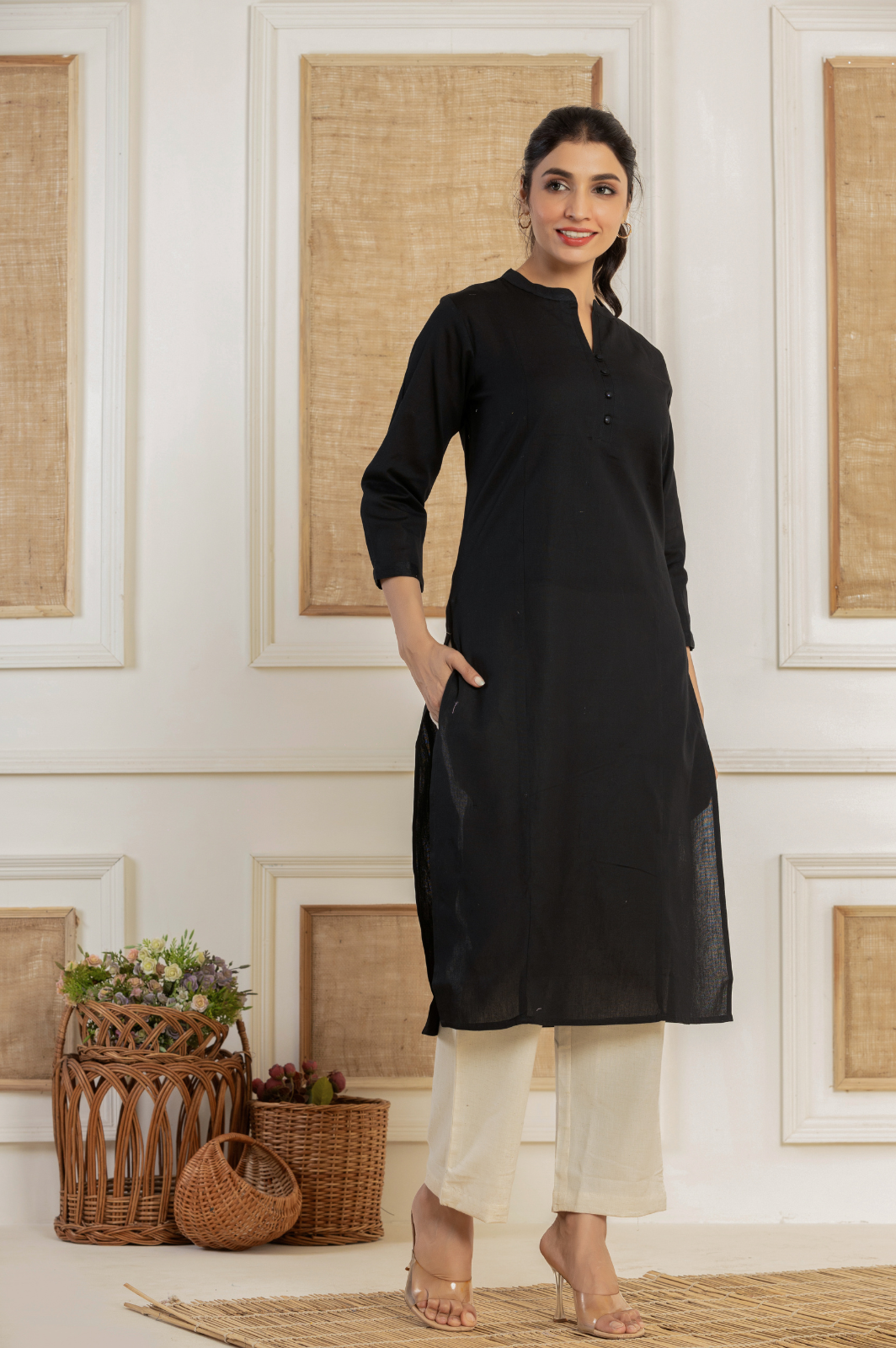 Solid black flex kurti with potli buttons