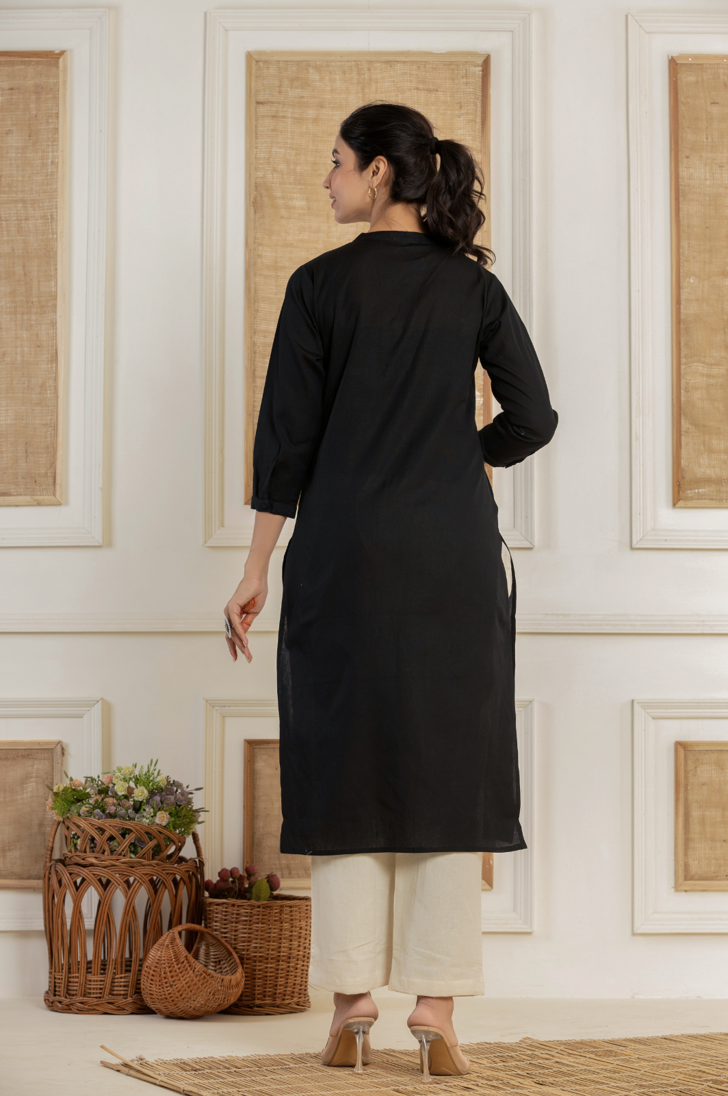 Solid black flex kurti with potli buttons