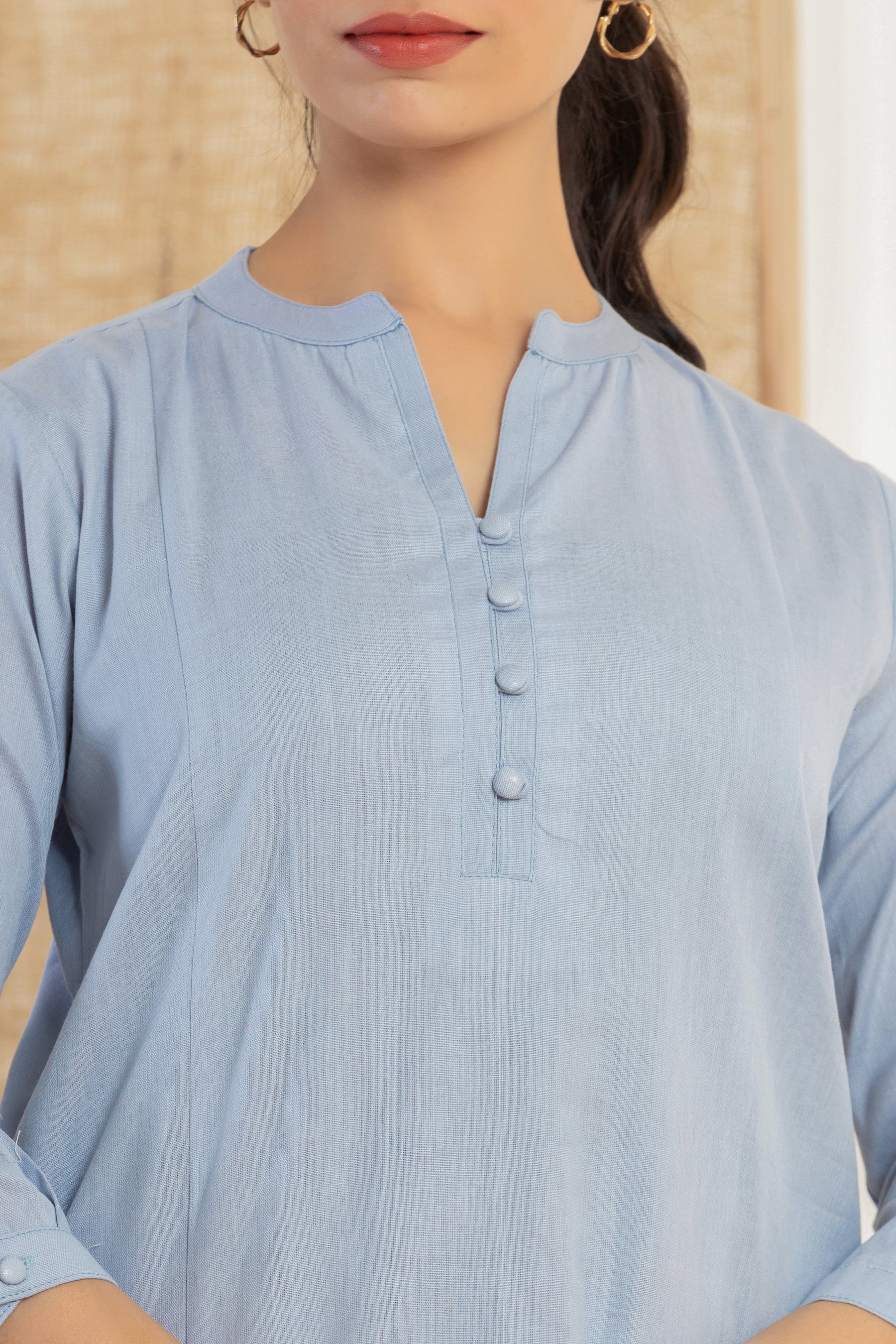 Solid blue flex top with potli buttons