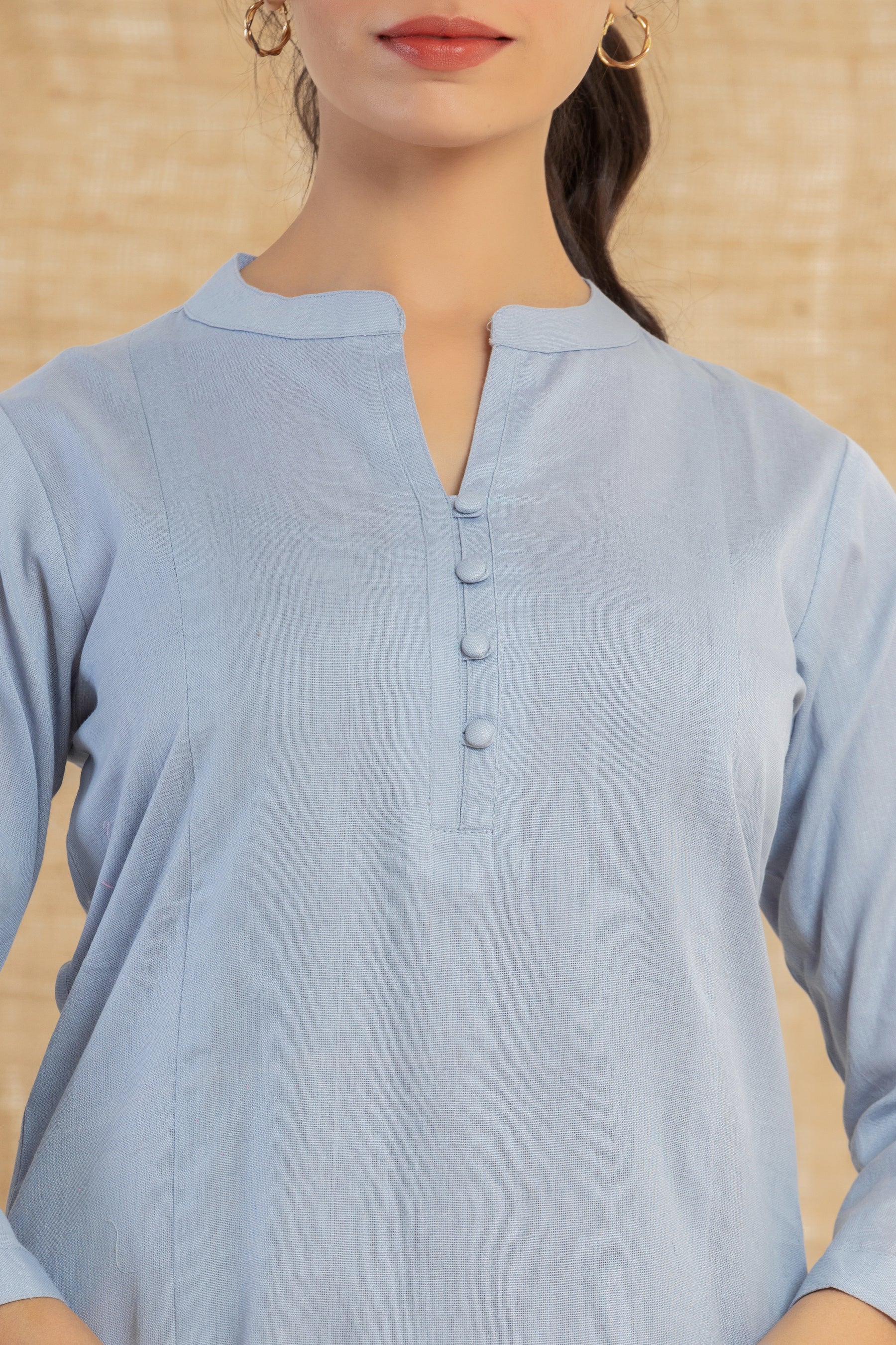 Solid blue flex kurti with potli buttons