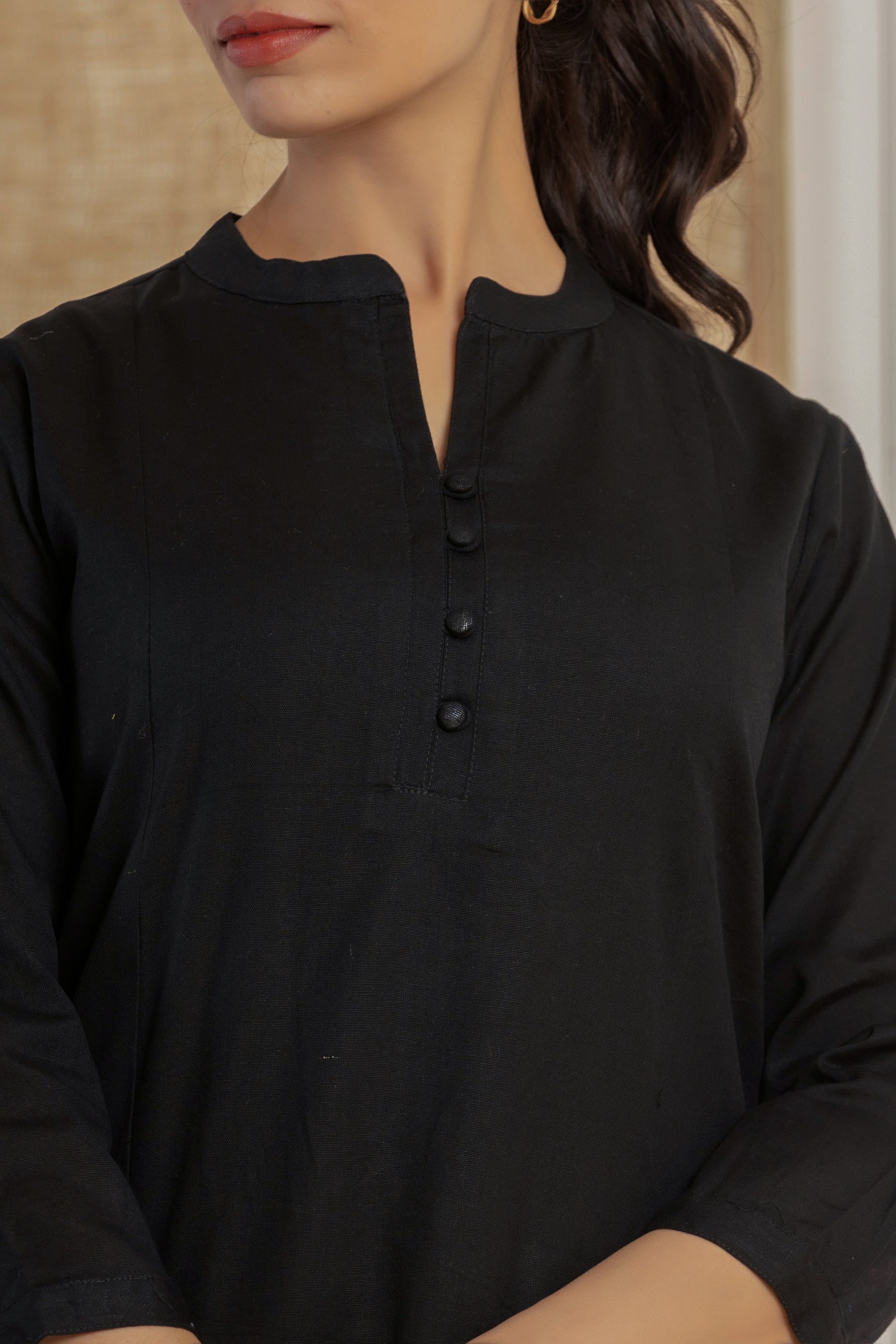 Solid black flex kurti with potli buttons
