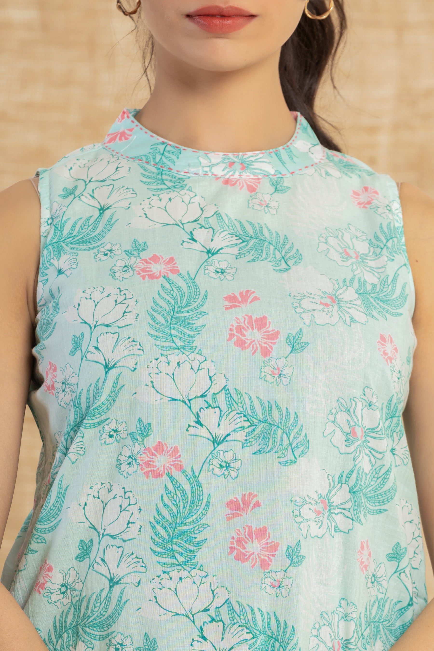 Sleeveless floral printed blue cotton kurti