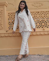 White cotton flex co-ord set with red floral embroidery