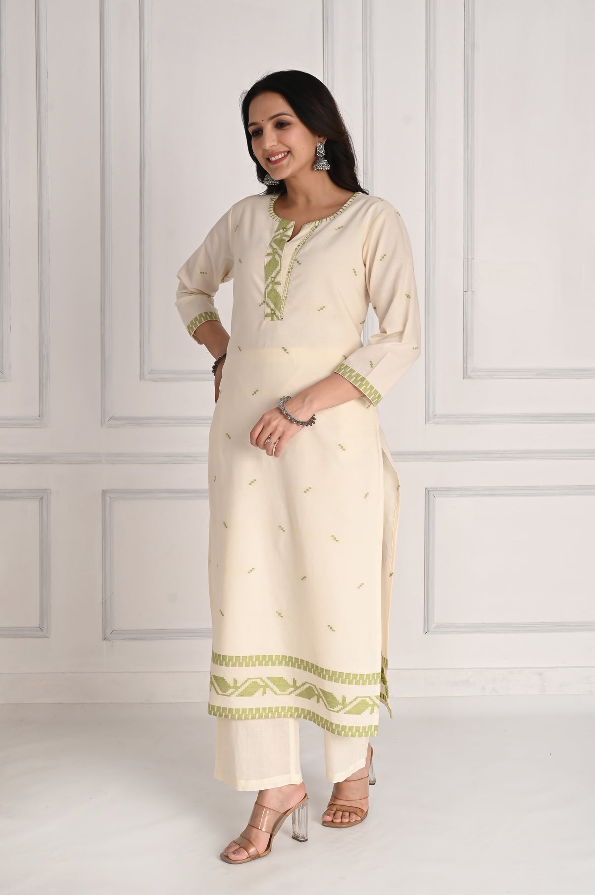 Self textured white cotton kurta set with green dupatta