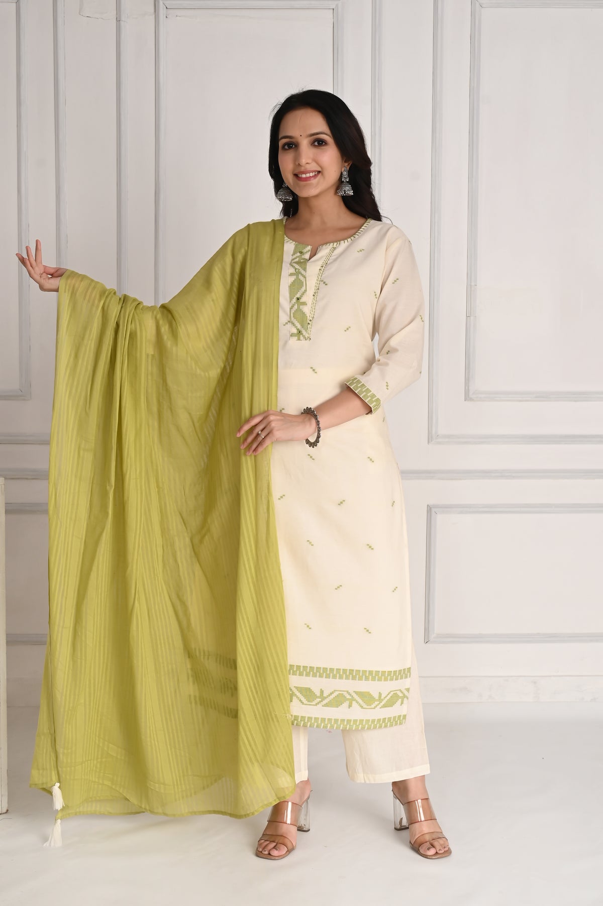 Self textured white cotton kurta set with green dupatta