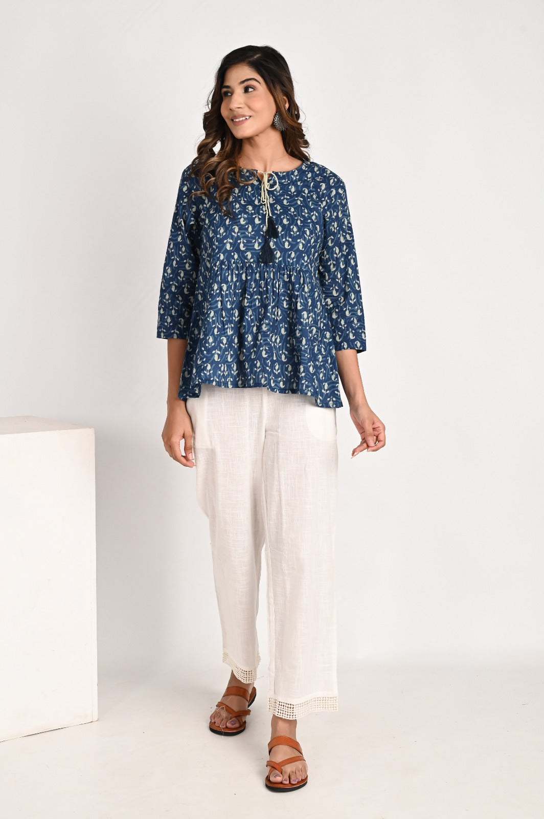 Peplum Blue Top With Tassel