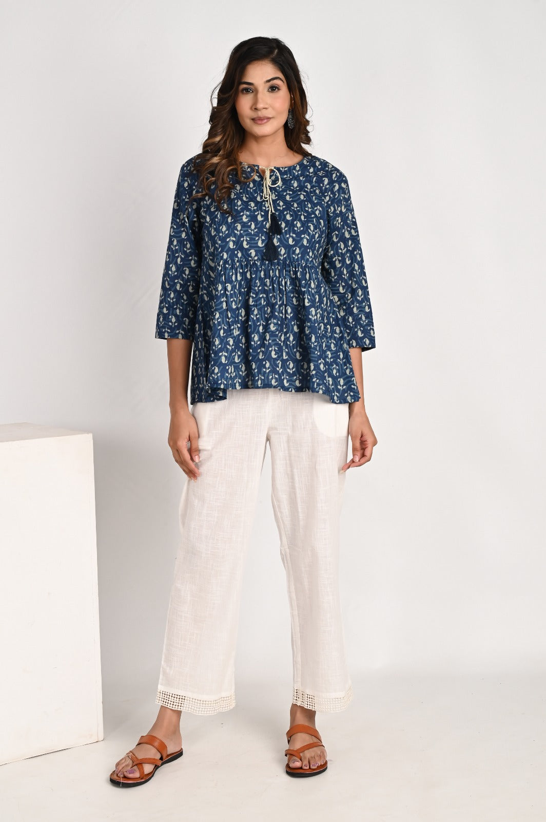 Peplum Blue Top With Tassel