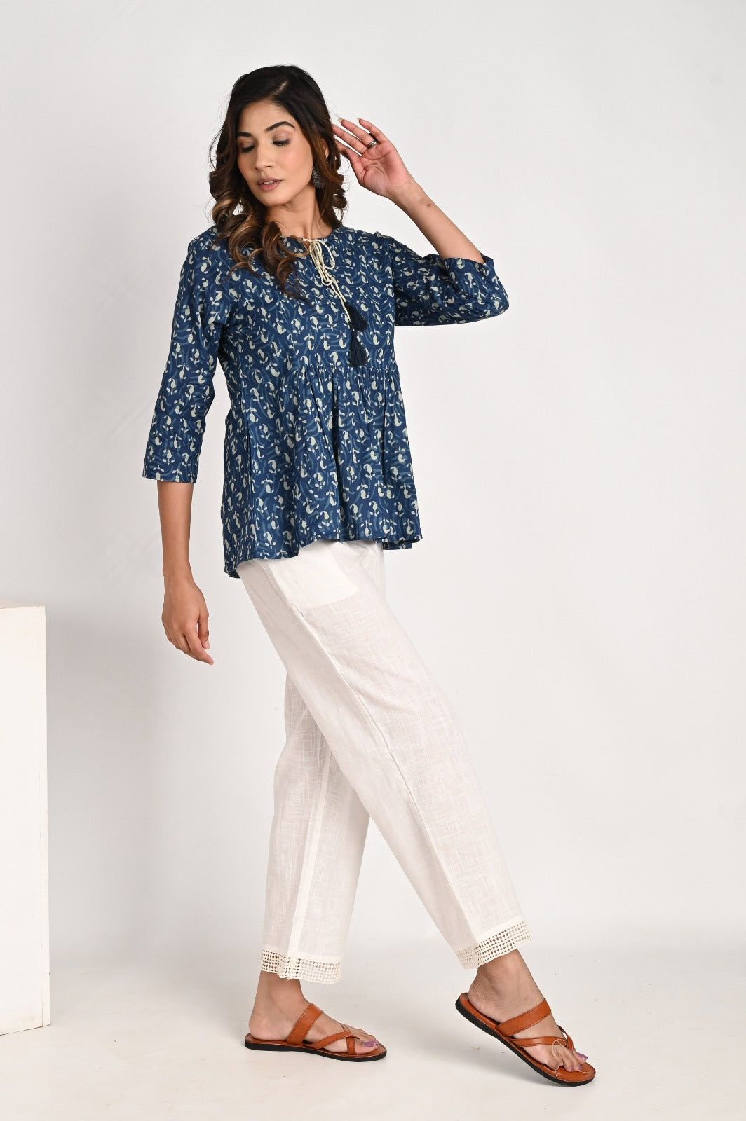 Peplum Blue Top With Tassel