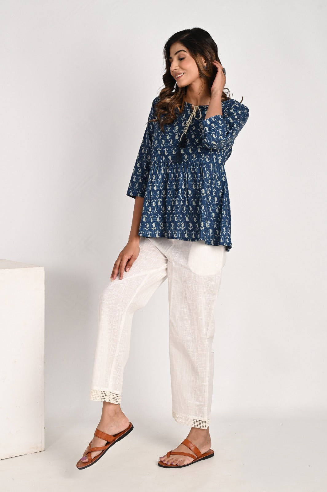 Peplum Blue Top With Tassel