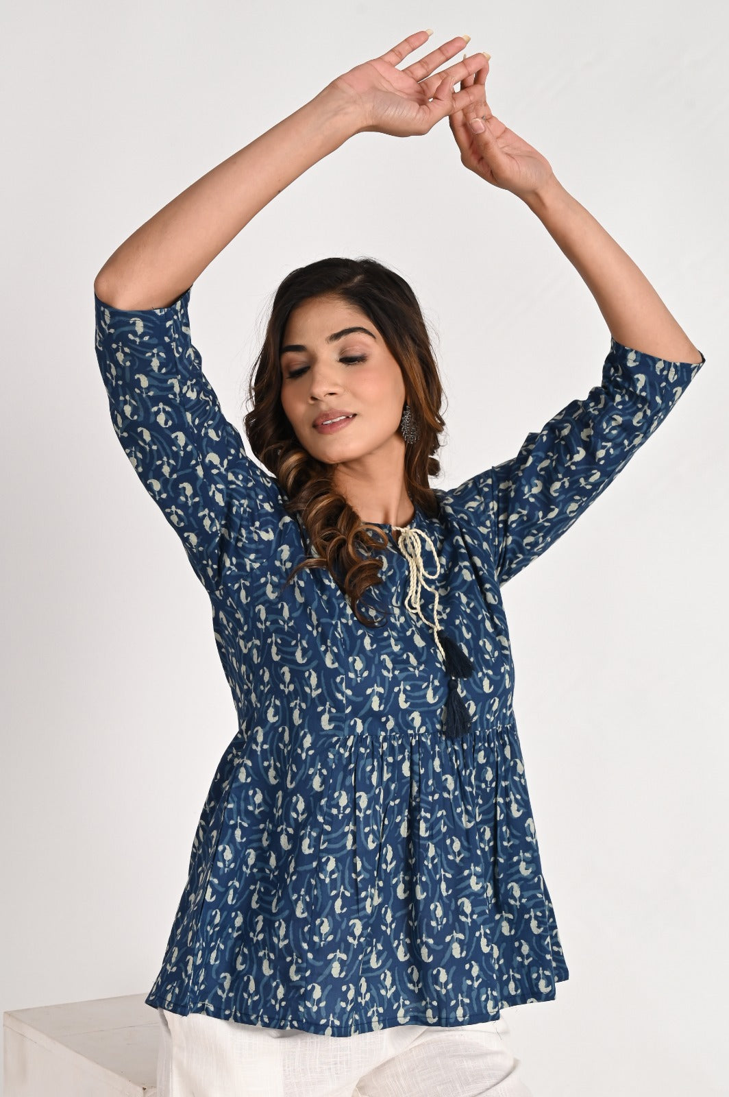 Peplum Blue Top With Tassel