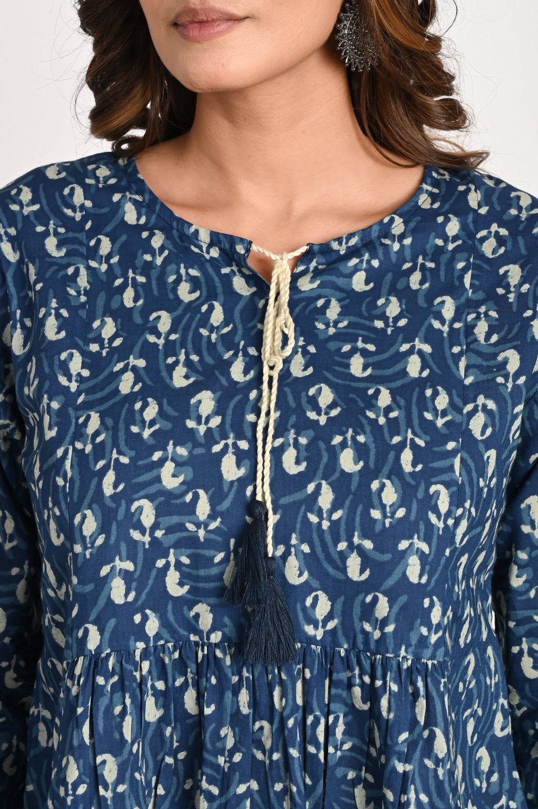 Peplum Blue Top With Tassel