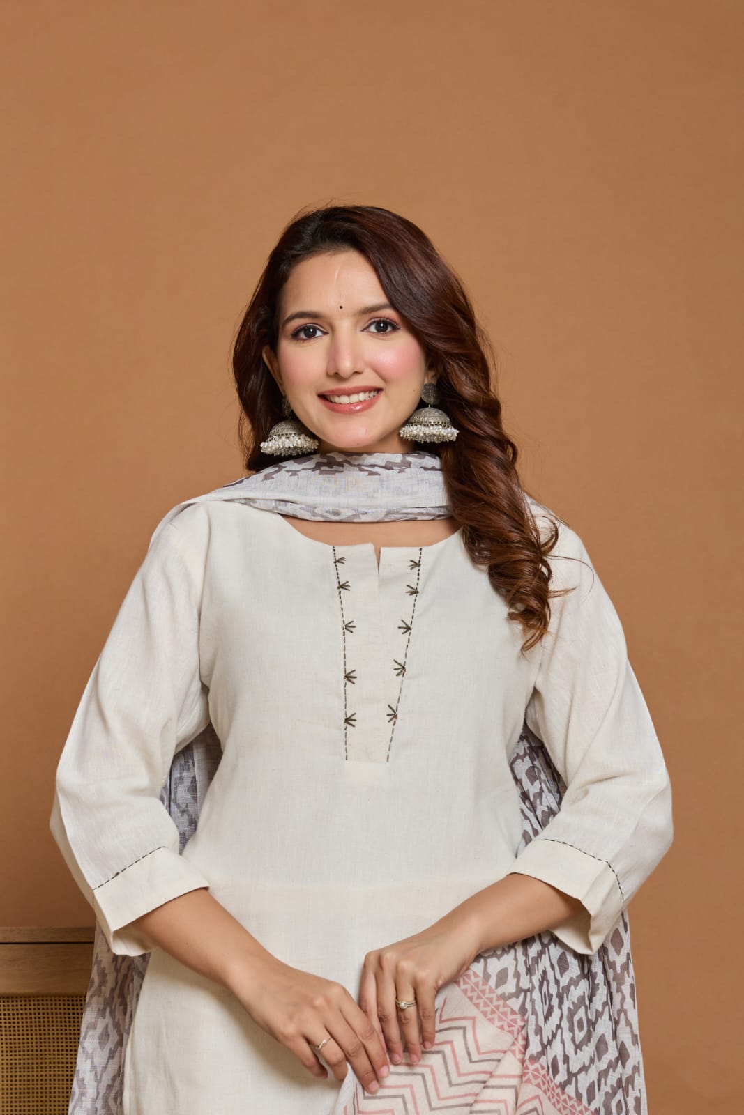 White kurta set with abstract print dupatta