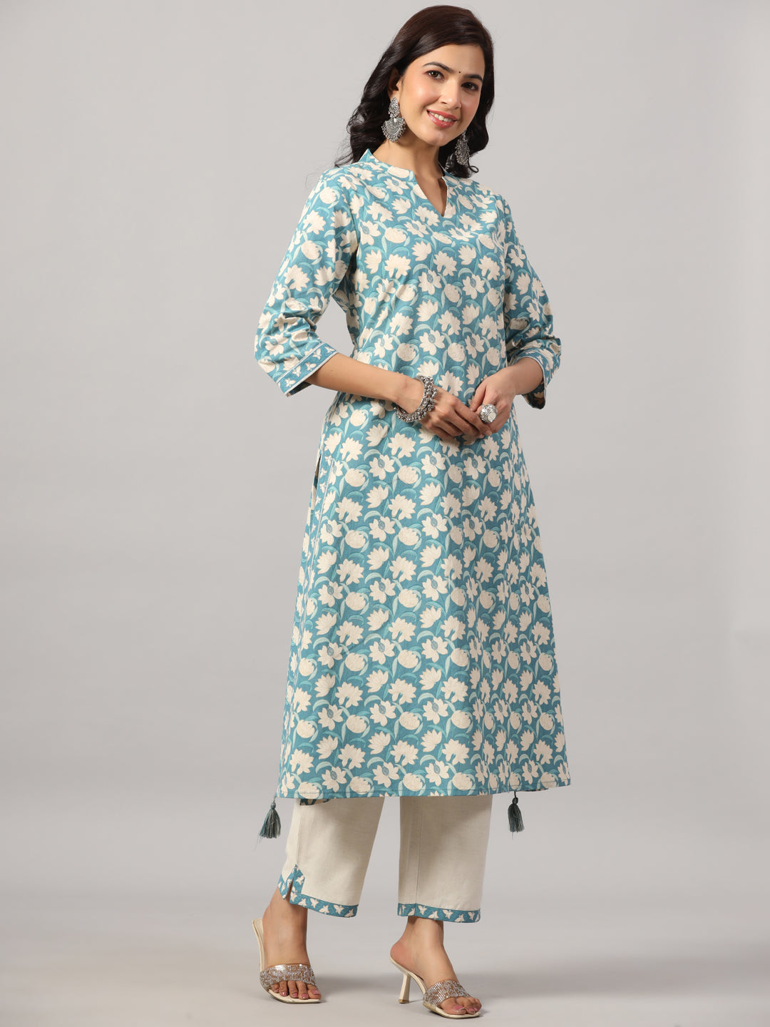 Blue A-Line Floral Kurta Set with Tassels