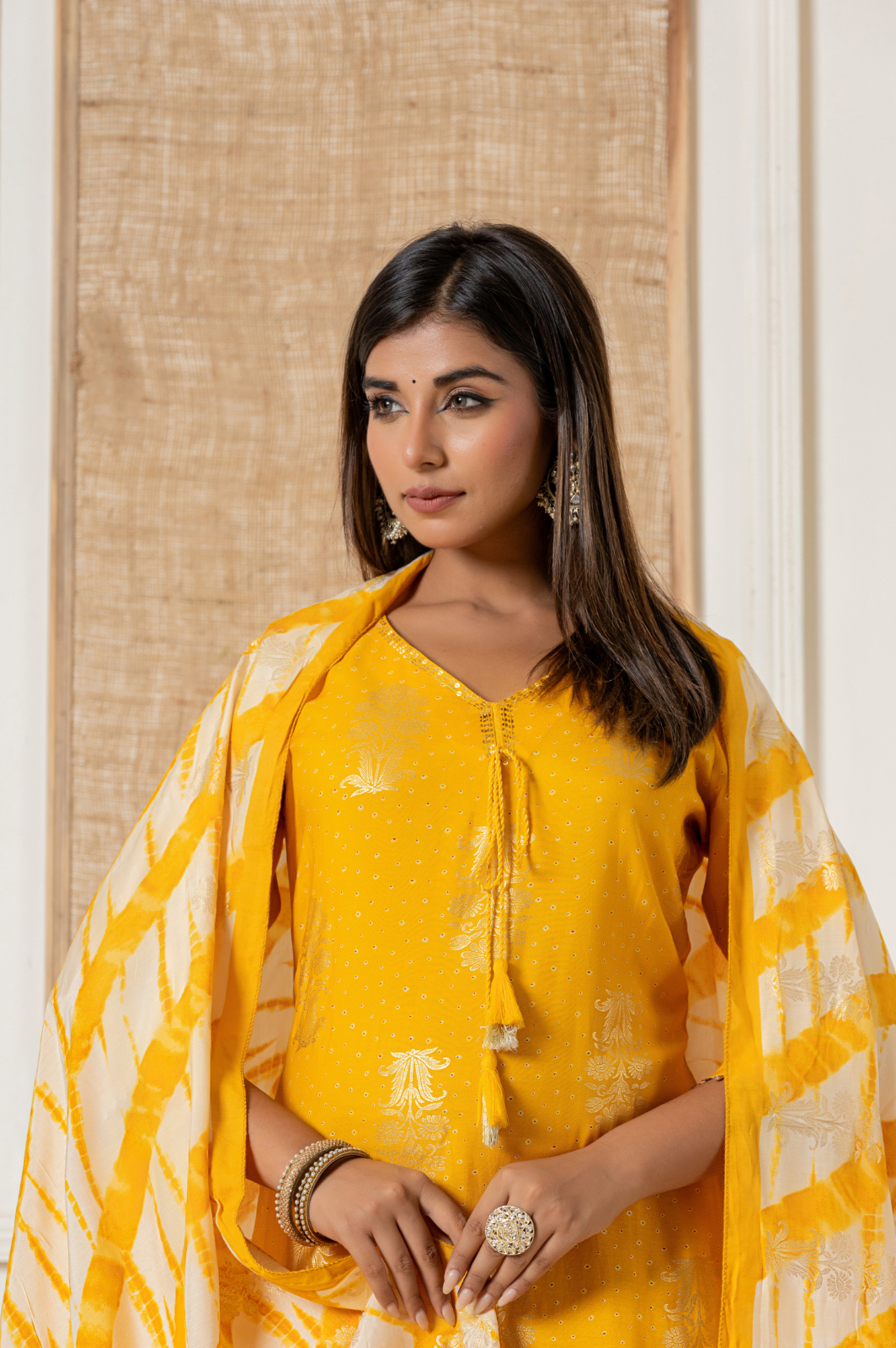 Muslin foil printed yellow kurta set with leheriya dupatta