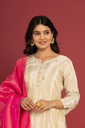 Shimmer white kurta set with pink dupatta