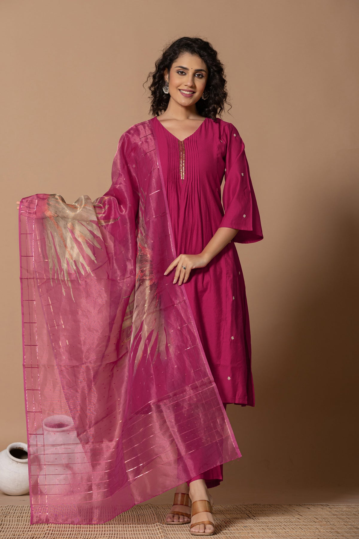 Muslin pleated solid pink kurta set with tissue dupatta