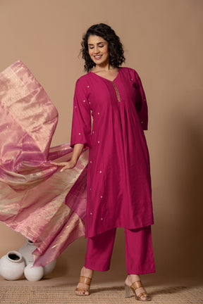 Muslin pleated solid pink kurta set with tissue dupatta